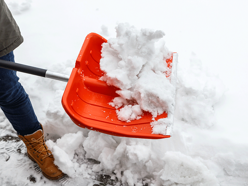 shoveling snow, winter weather, franklin, milwaukee, slippery, icy, slippery roads, weather