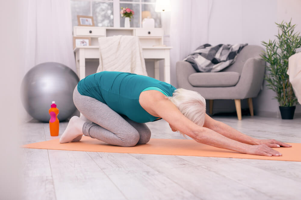 Two stretches that can help stop muscle spasms in the back shutterstock 1081872854 how to stop muscle spasms in back