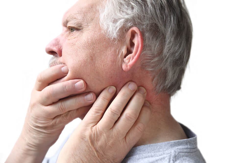 What causes neck and jaw pain at the same time? shutterstock 100964284 neck and jaw pain