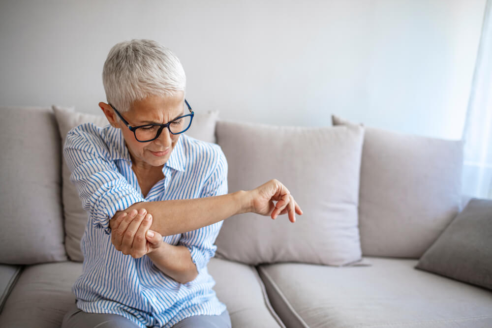 How do bone spurs develop in the elbow? shutterstock 1814864396 bone spur elbow
