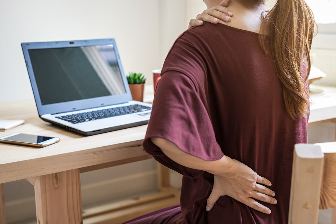Burning sensation in your lower back and abdomen: Here are some possible explanations young woman working at home and having back pain 2021 10 06 09 51 49 utc Burning sensation in your lower back and abdomen: Here are some possible explanations