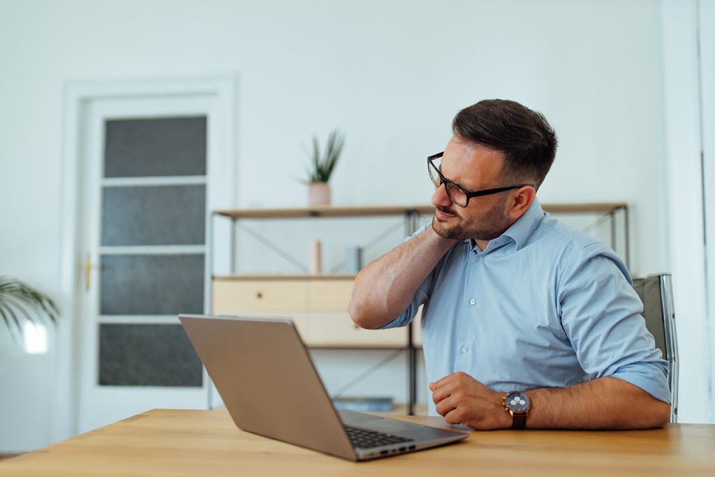 What's causing the pain in the back of my head at the base of my skull (and how can I ease it)? man holding his neck because of pain 2022 12 18 17 36 00 utc what's causing the pain in the back of my head at the base of my skull (and how can i ease it)? neck pain