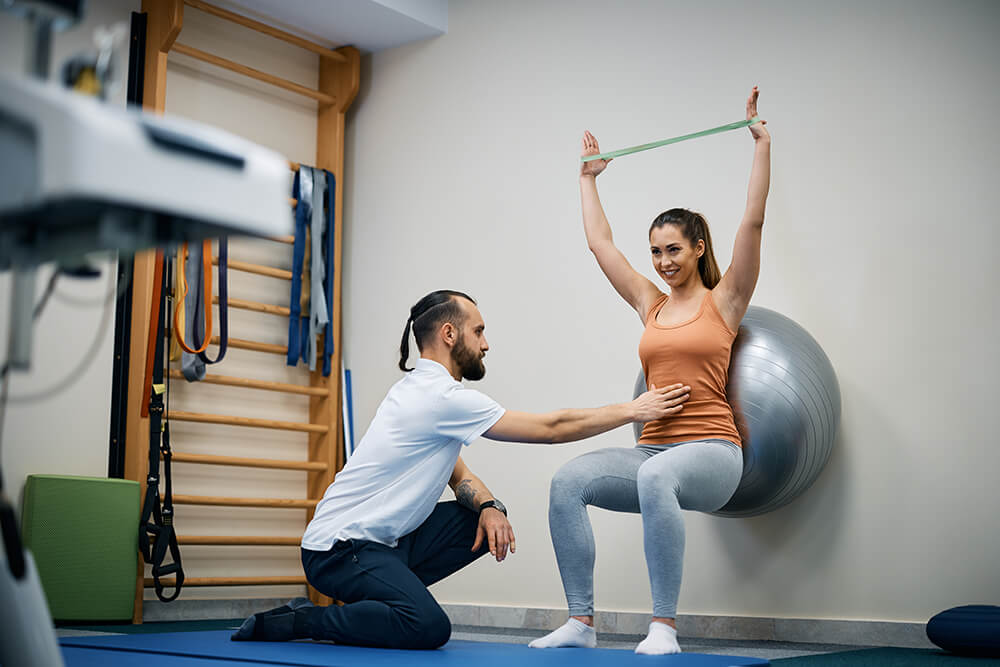 Personal trainers vs. physical therapists: 6 key differences physiotherapist assisting young sportswoman with e 2023 11 27 05 35 48 utc 1 personal trainers vs. physical therapists: 6 key differences physical therapy