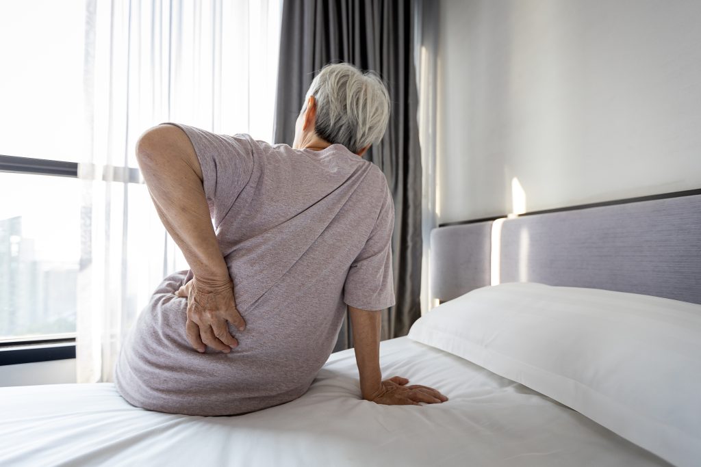 How to Relieve Hip Pain From Sleeping On Your Side AdobeStock 403583141 how to relieve hip pain from sleeping on your side hip pain