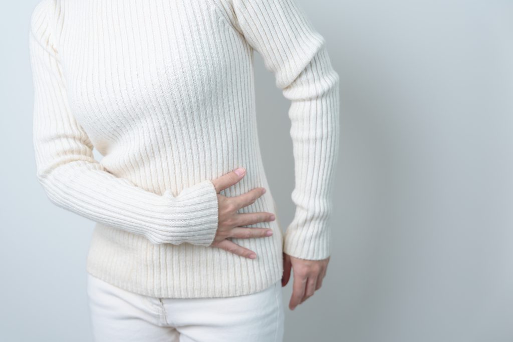 why does my stomach hurt and radiate to my back? back pain