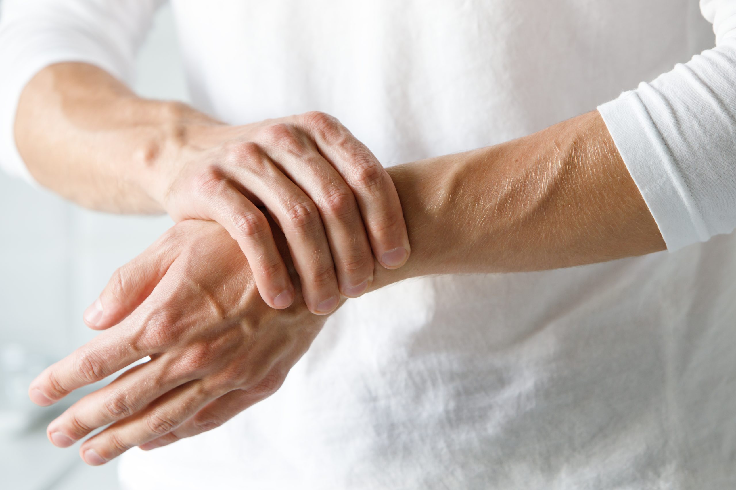 Why Does the Top of My Wrist Hurt? AdobeStock 288567874 scaled Why Does the Top of My Wrist Hurt?